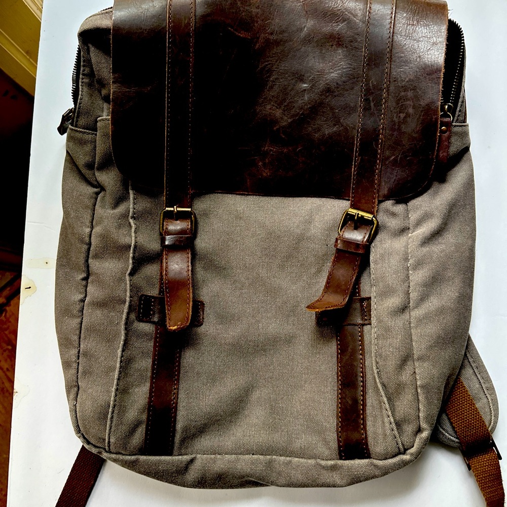 Amazing wax canvas and leather backpack bag! This is classic & great condition